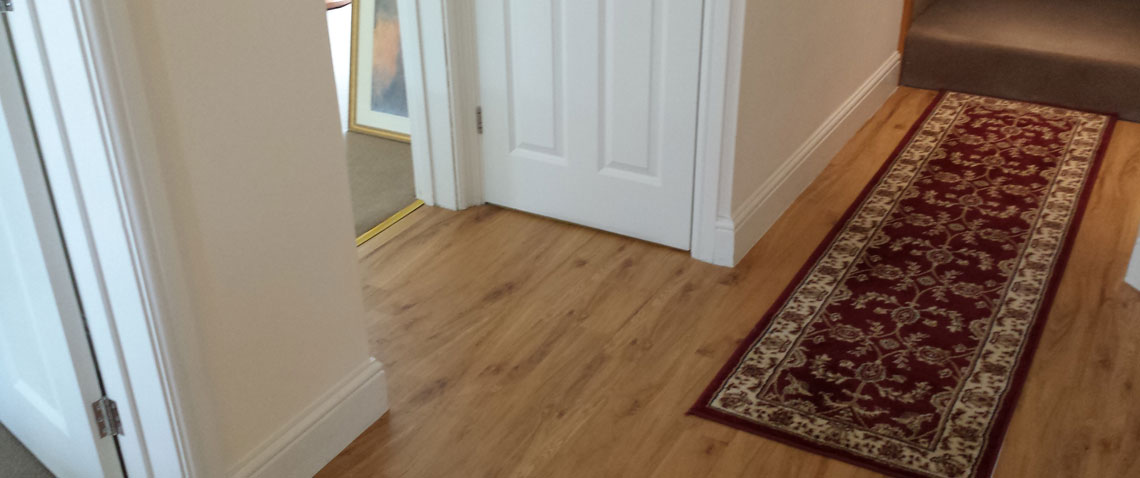 Supply and fit of carpets, laminates and vinyl